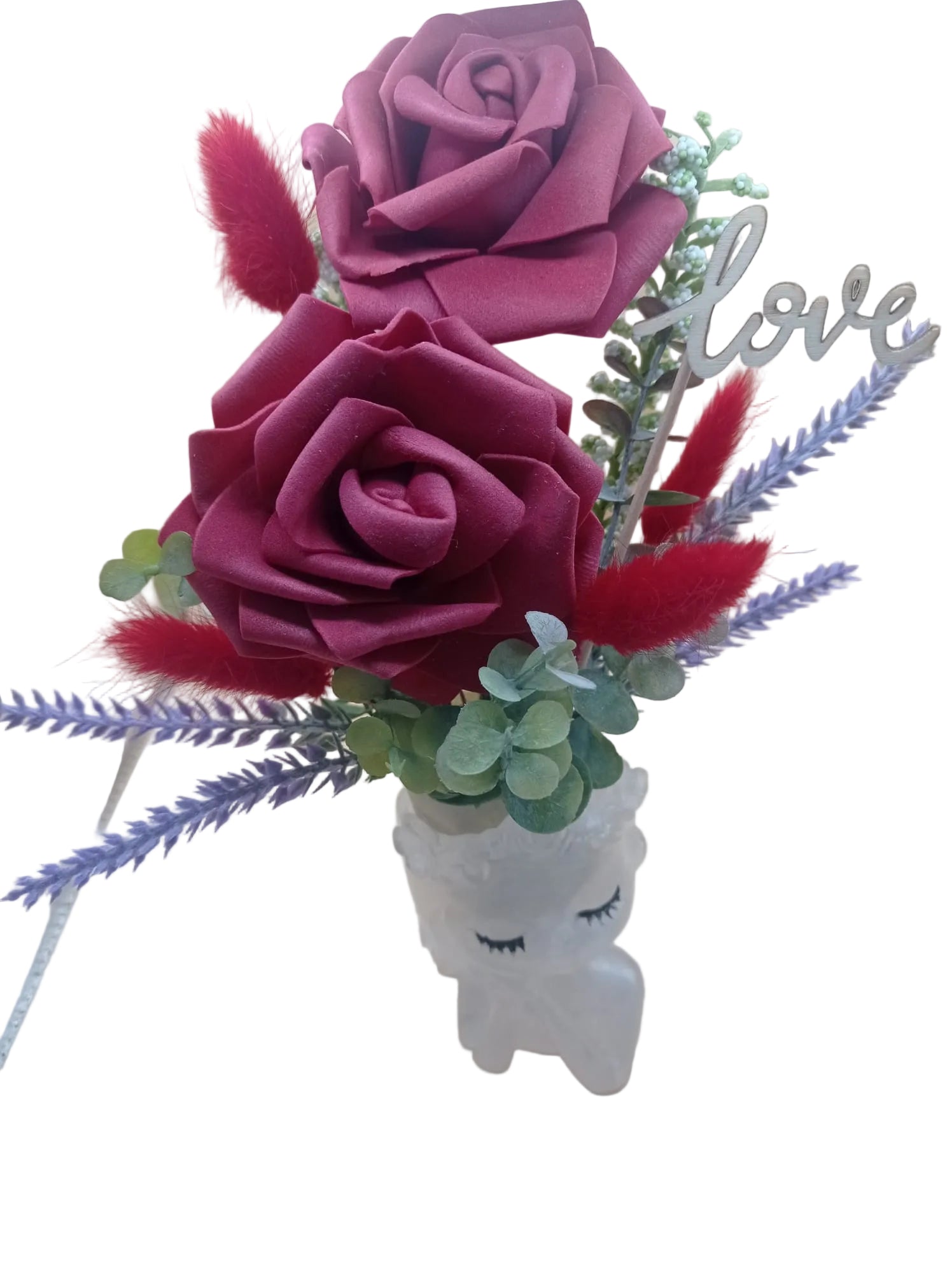 Maceta decorativa de niña con flores